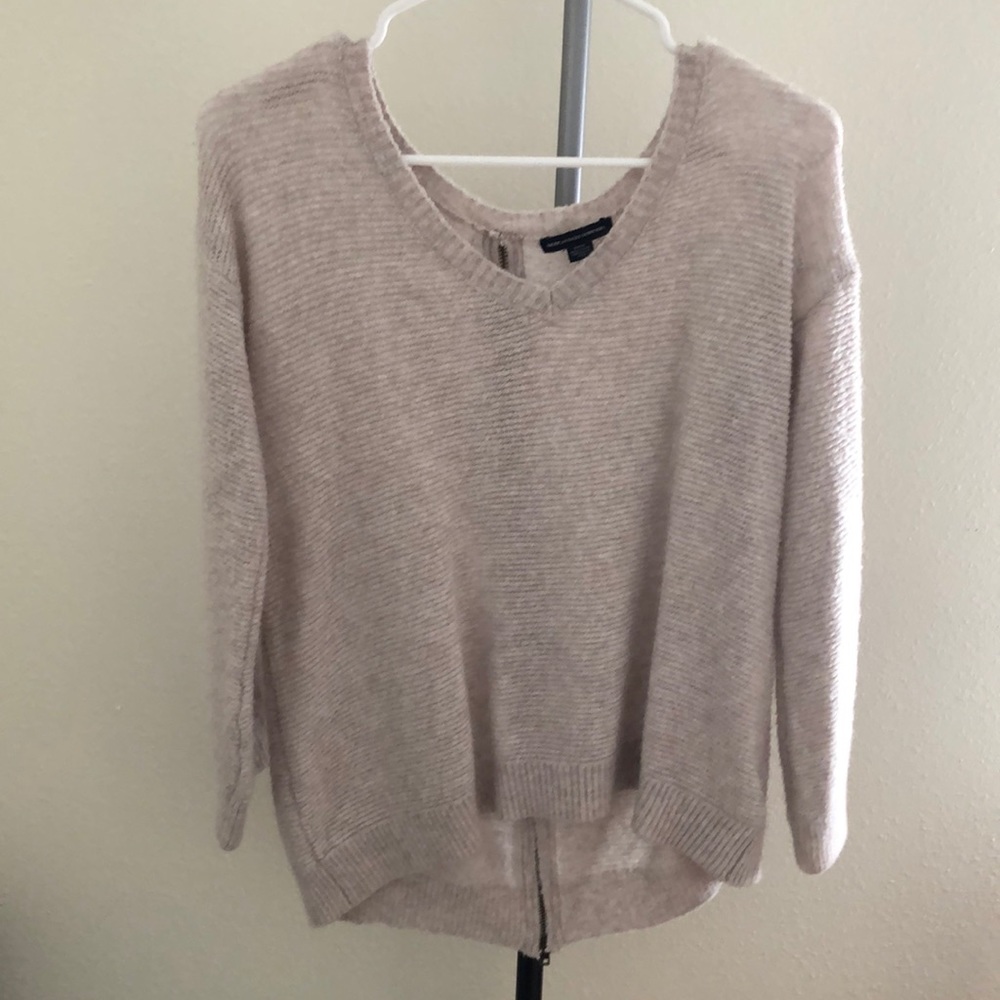 Sweater with zipper down the back